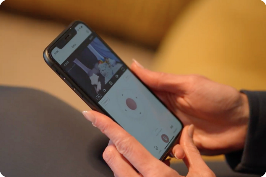 Parent using the Cubby app for monitoring