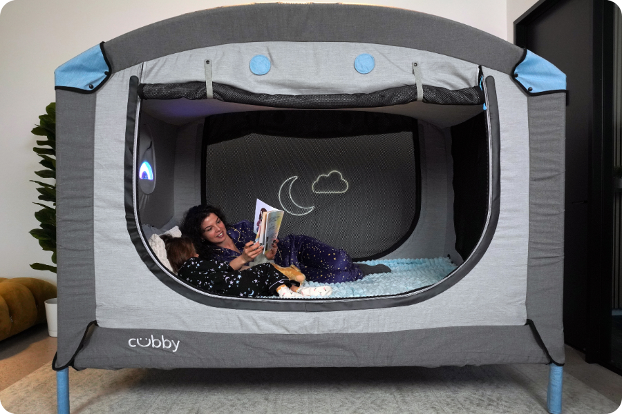 Child resting inside the Cubby canopy